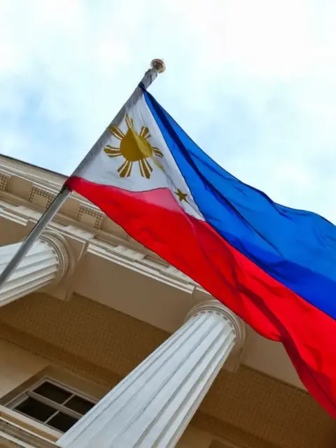 Eine Flagge als Symbol für Krankenversicherung auf den Philippinen